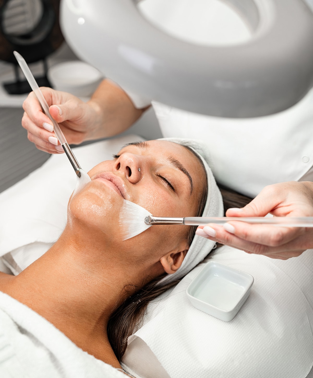 Facial treatment in a skincare session.