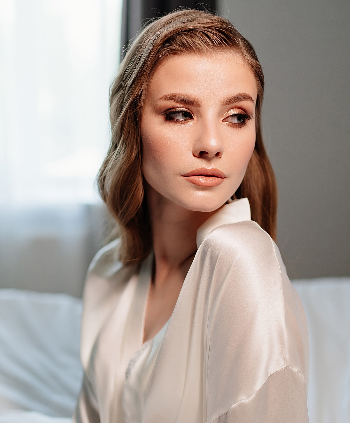 Bridal portrait with soft lighting and elegant attire