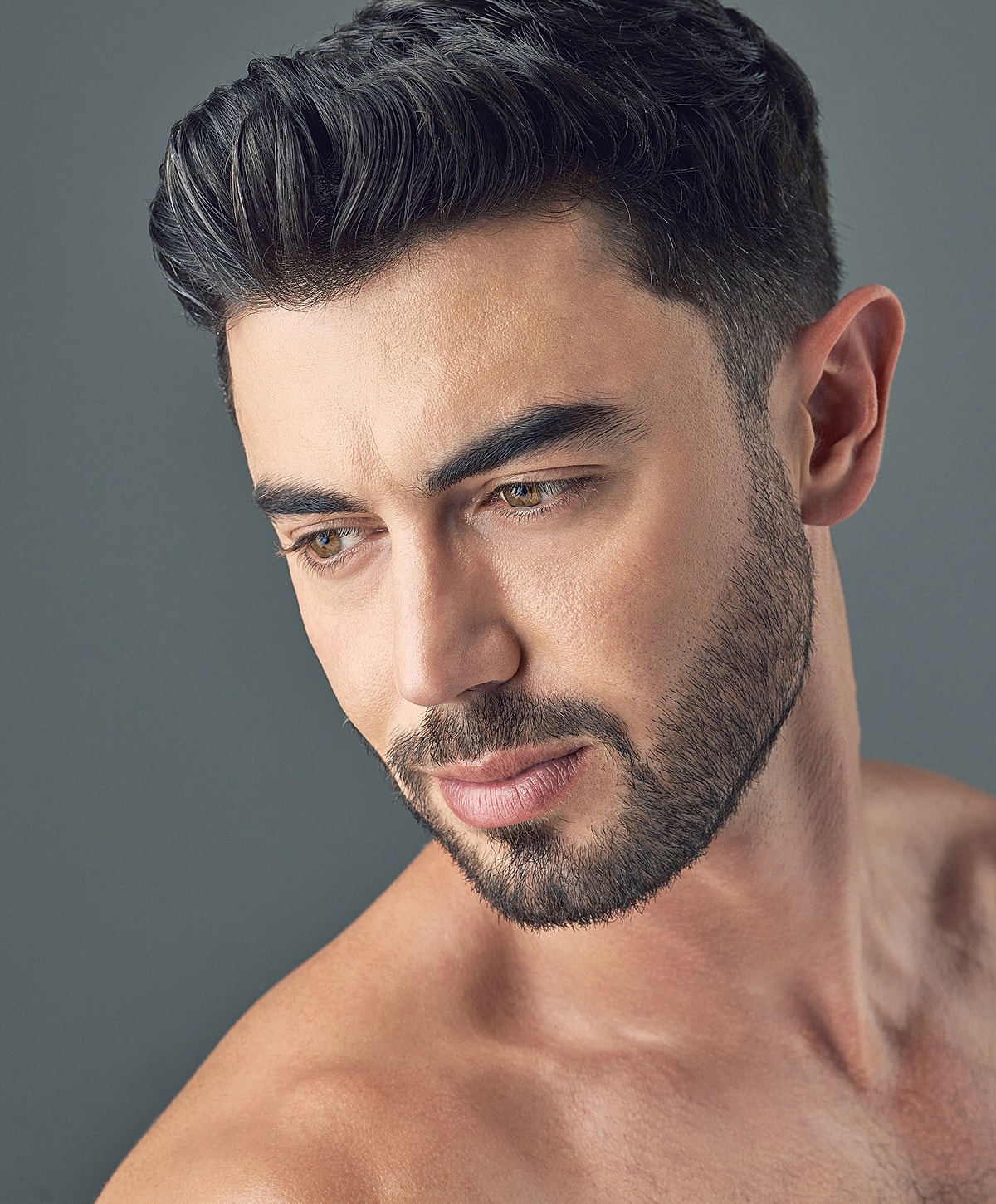 Close-up portrait of a man with beard.