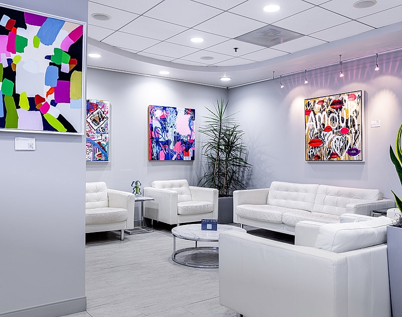 Modern waiting area with vibrant wall art.