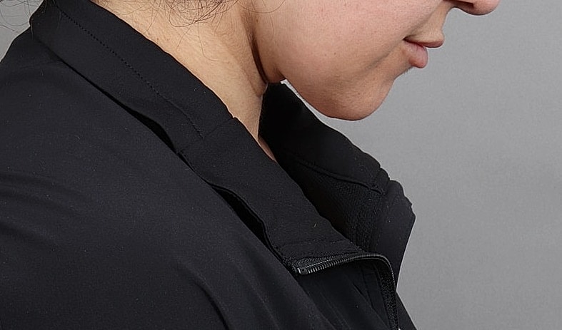 Profile view of a person in a jacket.