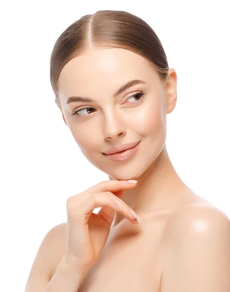 Woman with soft smile and elegant pose.