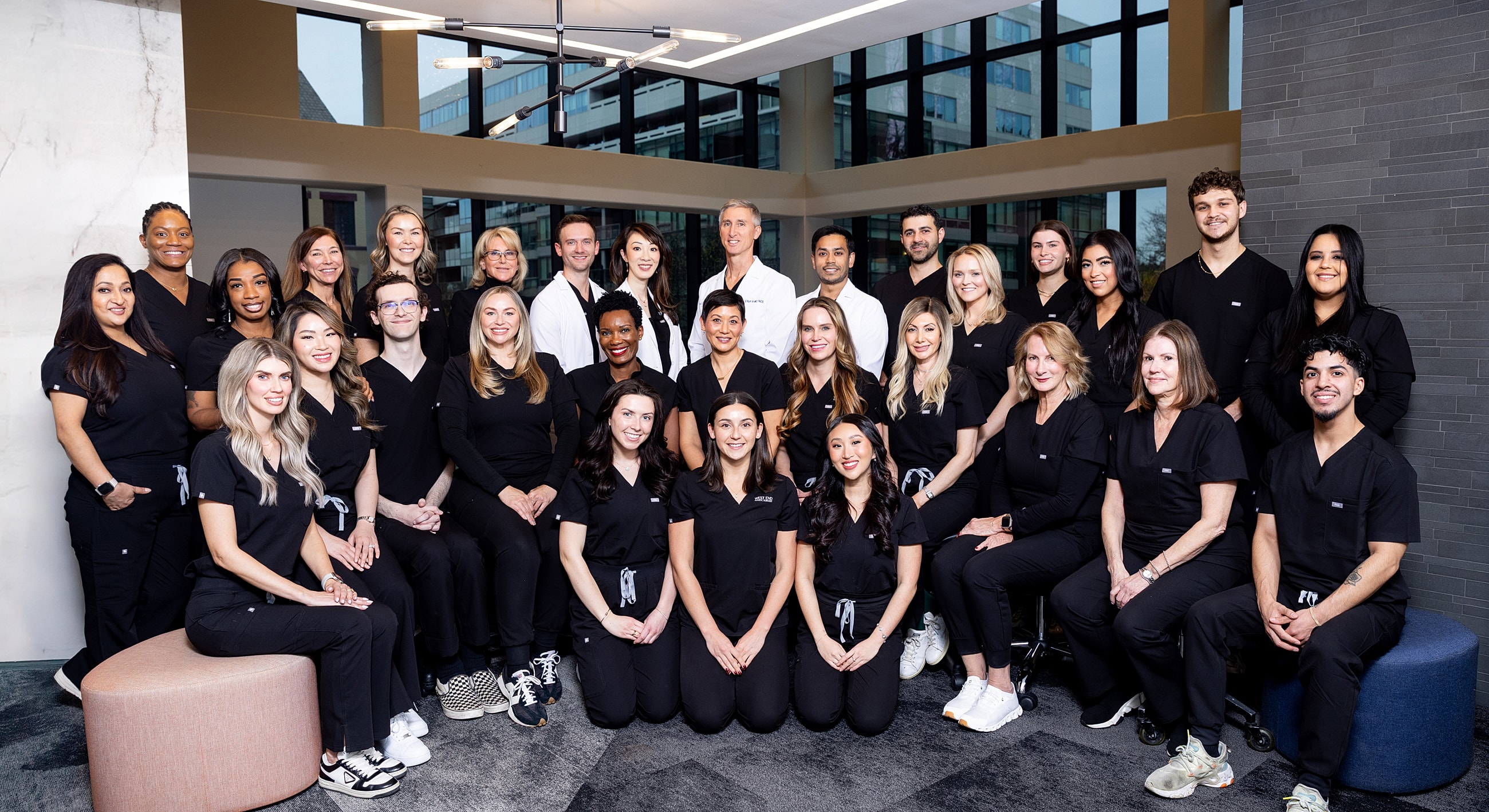 Group photo of healthcare professionals in uniforms.