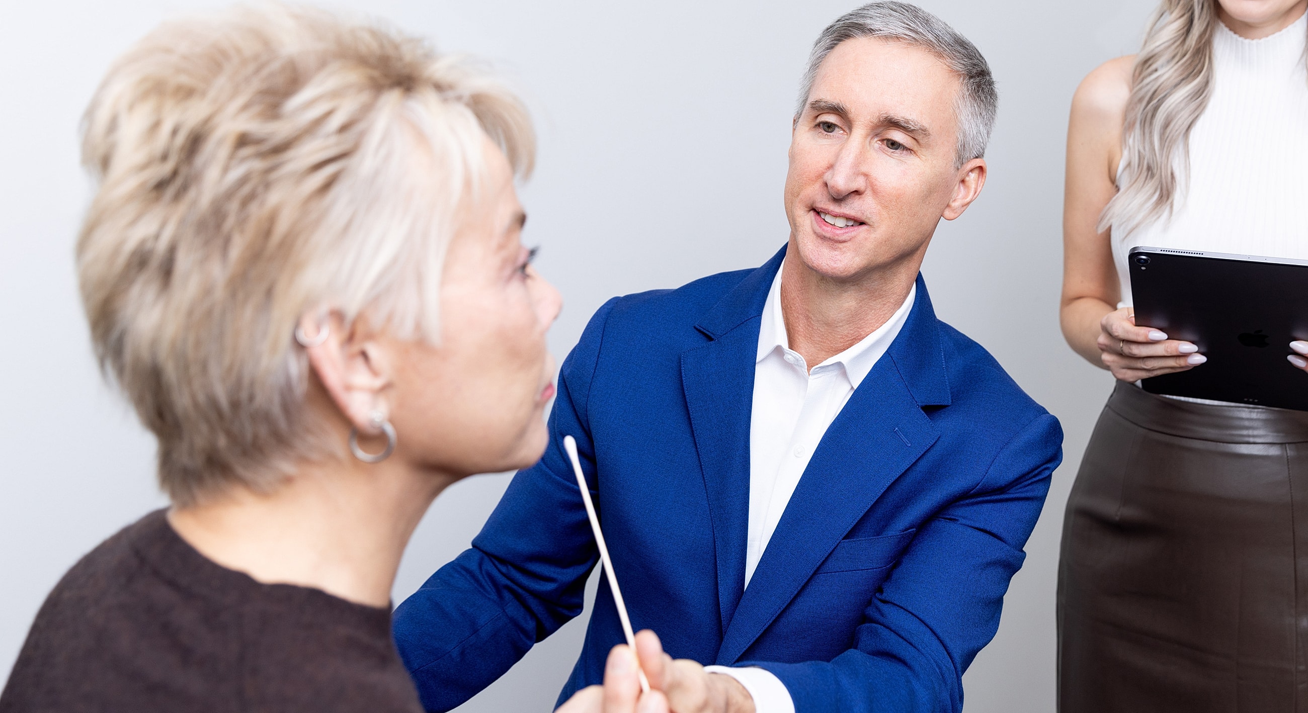 Consultation in a clinical aesthetic setting.