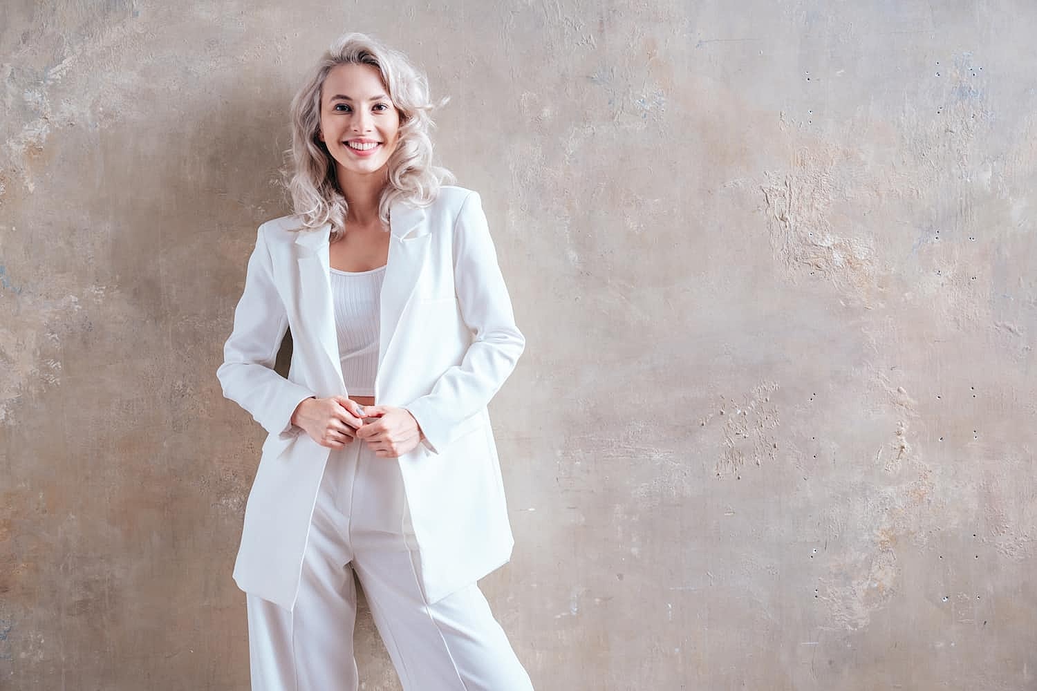 Facelift image with woman in white jumpsuit
