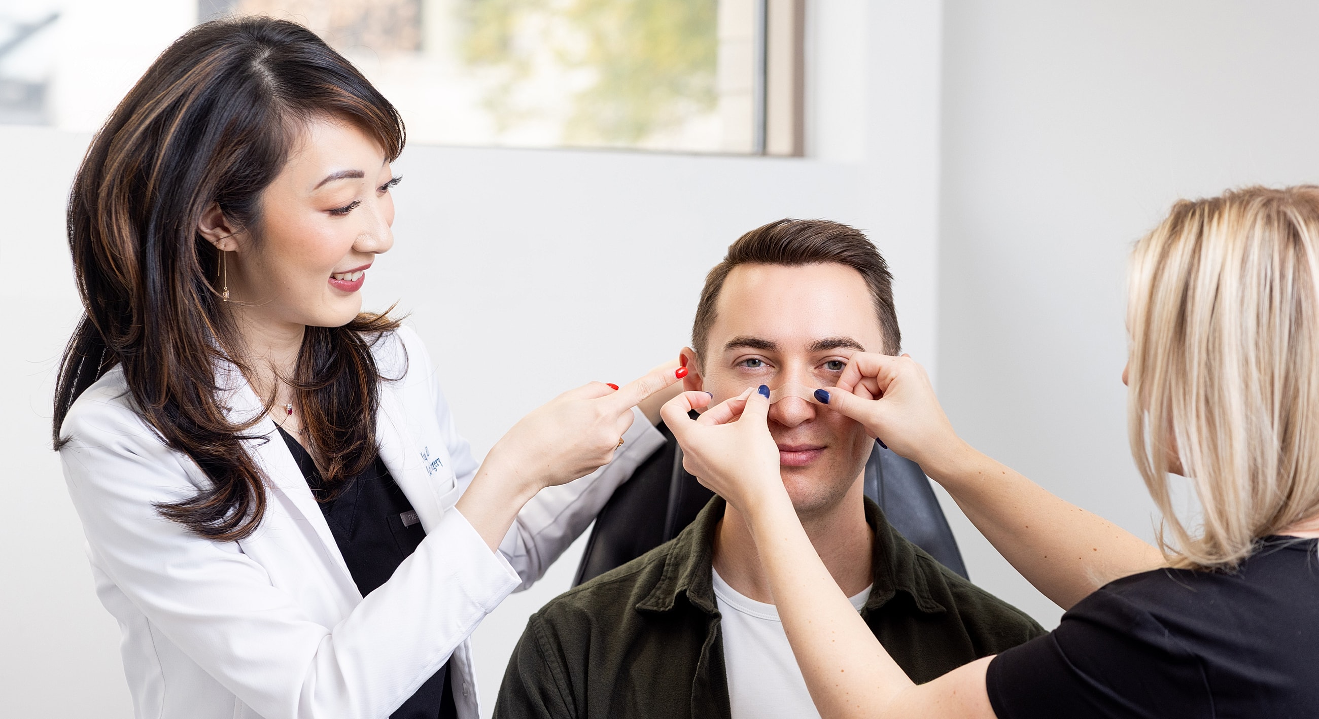 Cosmetic consultation with specialists and client.