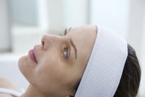 Woman having chemical peel
