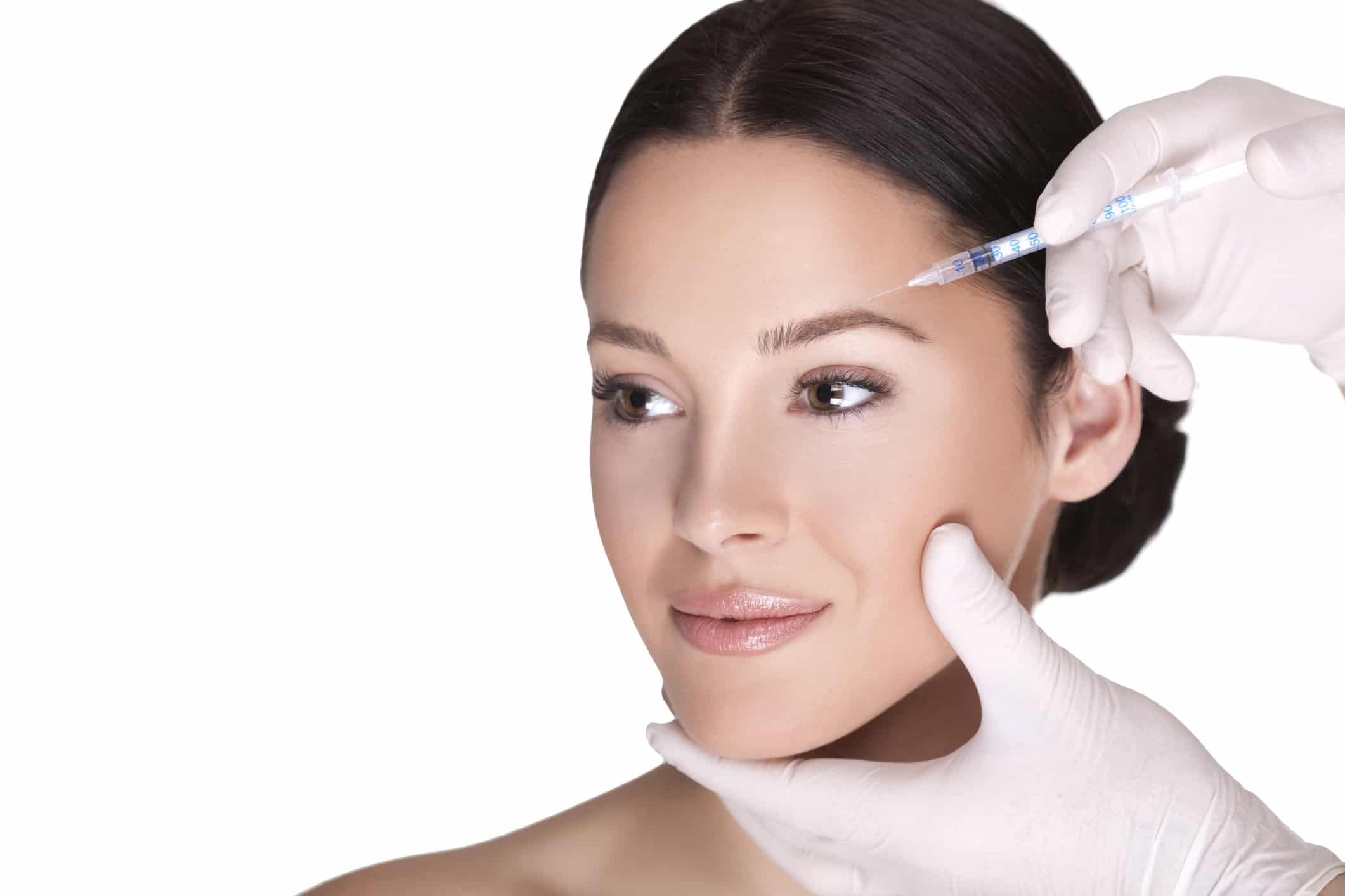 Close-up of cosmetic injection of botox in the wrinkles on the forehead