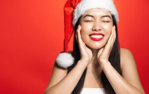 Portrait,Of,Beautiful,Asian,Woman,In,Santa,Claus,,Christmas,Holiday
